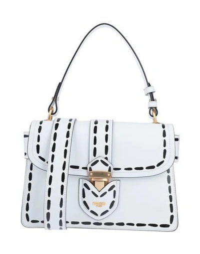 Shop Moschino Handbag In White