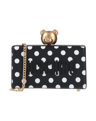 Shop Moschino Cross-body Bags In Black