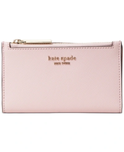 Shop Kate Spade Spencer Slim Bifold Wallet In Tutu Pink/gold