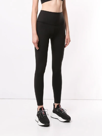Shop Beyond Yoga Logo Detail Low-rise Leggings In Black