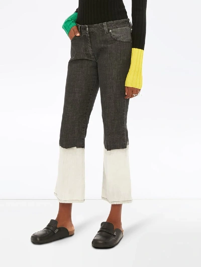Shop Jw Anderson Cropped Flared Jeans In Black