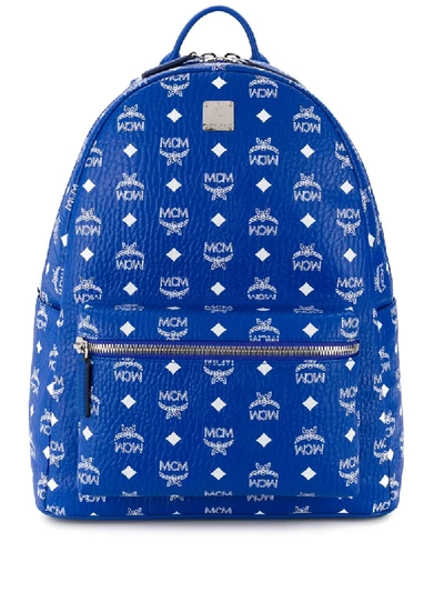 Shop Mcm All-over Logo Print Backpack In Blue