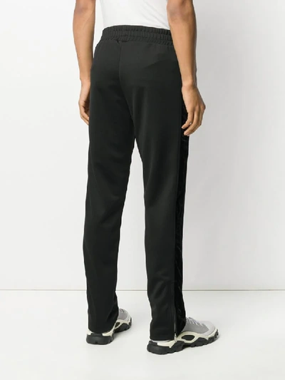 Shop Palm Angels Embroidered Palm Tree Track Pants In Black