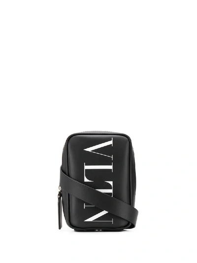 Shop Valentino Garavani Vltn Logo Messenger Bag In Black