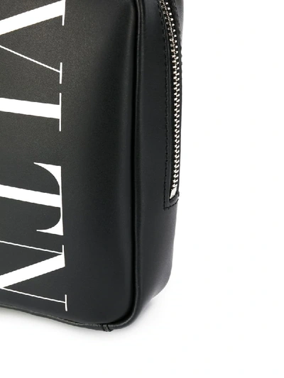 Shop Valentino Garavani Vltn Logo Messenger Bag In Black