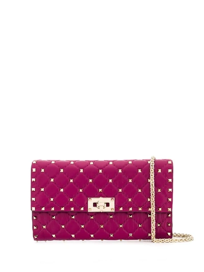 Shop Valentino Garavani Rockstud Spike Crossbody Clutch Bag In Pink