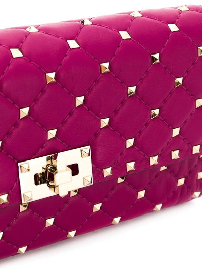 Shop Valentino Garavani Rockstud Spike Crossbody Clutch Bag In Pink