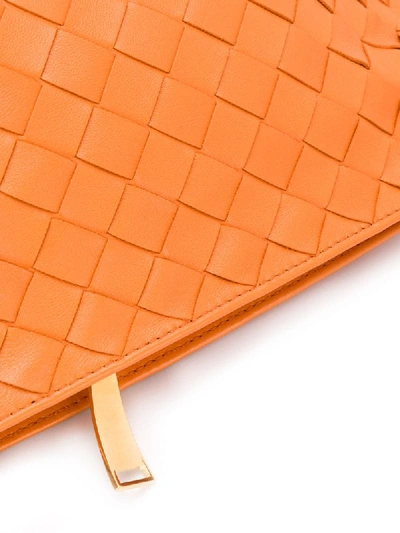 Shop Bottega Veneta Bv Twist Clutch In Orange