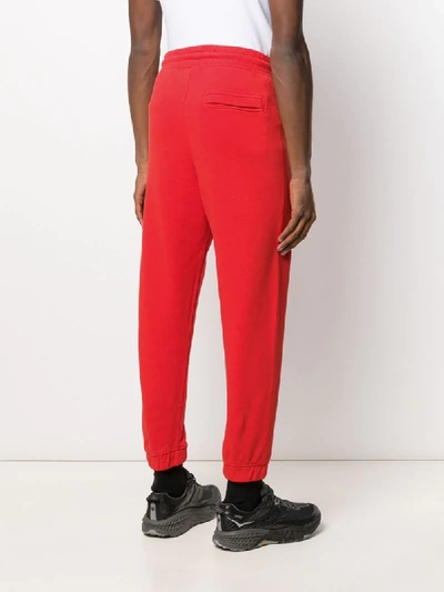 Shop Marcelo Burlon County Of Milan Relaxed-fit Cross Logo Track Pants In Red