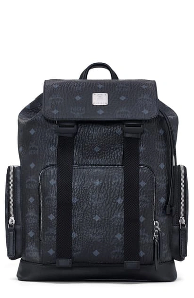Shop Mcm Brandenburg Coated Canvas Backpack In Black