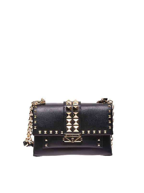 michael kors black bag with gold studs