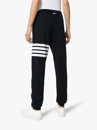 Shop Thom Browne Classic Four Stripe Track Pants In Blue