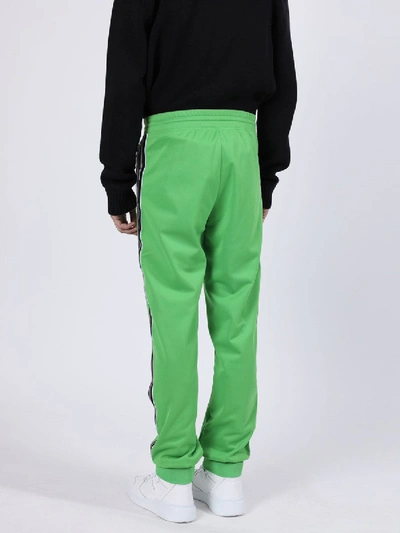 Shop Givenchy Ticker Logo Tape Sweatpants In Green