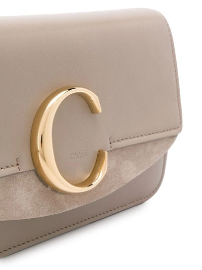Shop Chloé C-logo Crossbody Bag In Grey