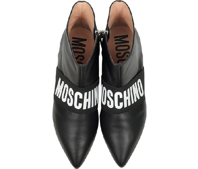 Shop Moschino Shoes Black Signature Leather Flat Ankle Boots