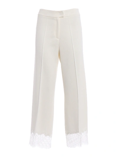 Shop Ermanno Scervino Lace Hem Cropped Trousers In White
