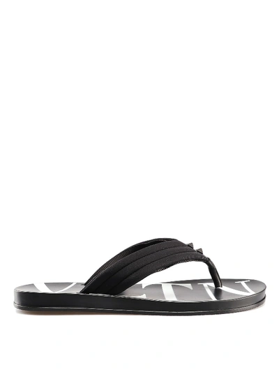 Shop Valentino Vltn Black Rubber Flip Flops