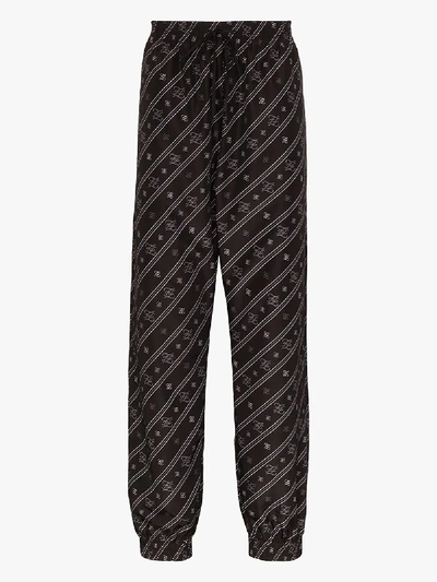 Shop Fendi Karligraphy Logo Shell Sweatpants In Black