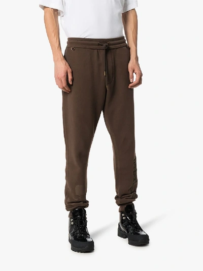 Shop Mastermind Japan X Timberland Logo Embroidered Track Pants In Brown