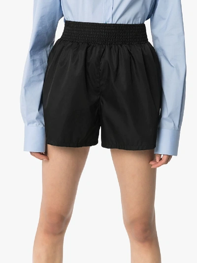 Shop Prada Smocked Waist Shorts In Black