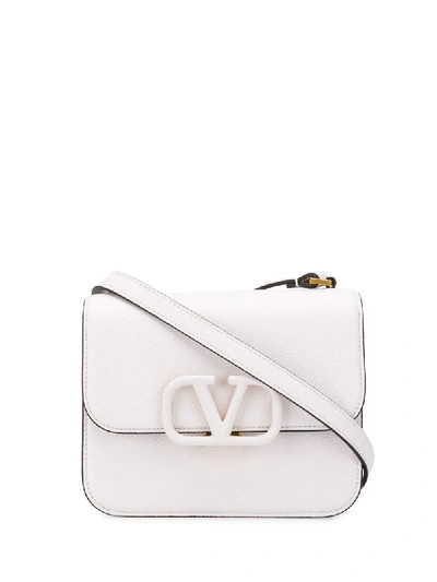 Shop Valentino Vsling Crossbody Bag In White