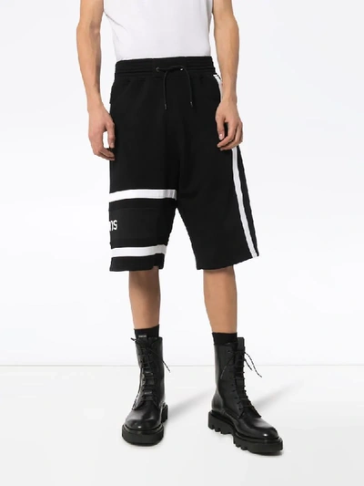 Shop Givenchy Embroidered Logo Track Shorts In Black