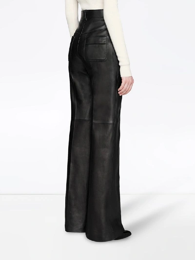Shop Gucci Flared Trousers In Black