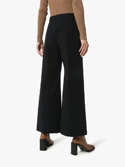 Shop Chloé Flared Buttoned Trousers In Blue