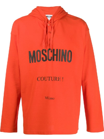 Shop Moschino Logo Print Hoodie In Orange