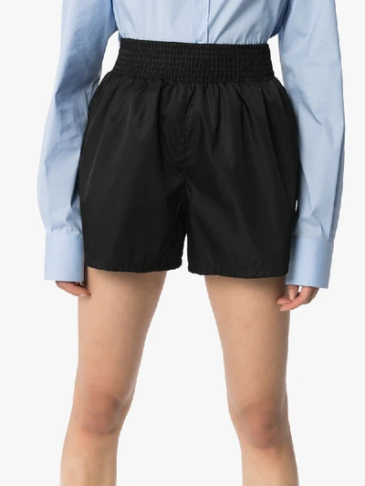 Shop Prada Smocked Shell Shorts In F0002 Nero