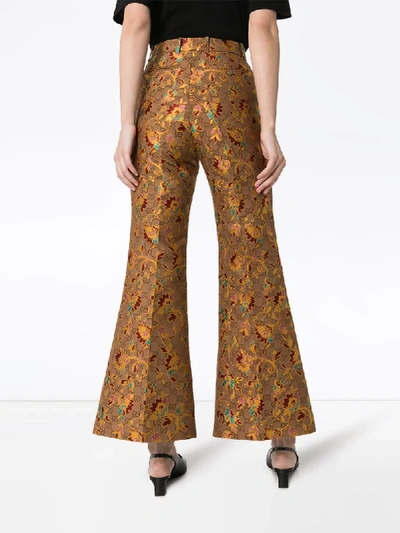 Shop Gucci Floral-jacquard Logo Flared Trousers In Brown