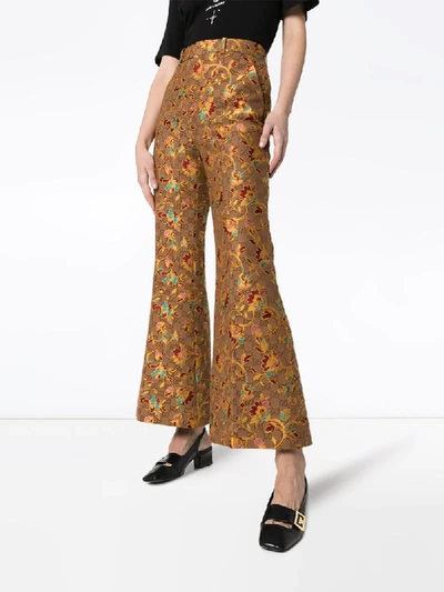 Shop Gucci Floral-jacquard Logo Flared Trousers In Brown