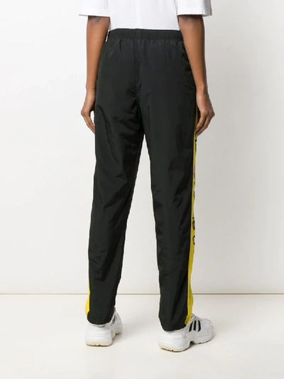 Shop Polo Ralph Lauren Logo Tape Track Pants In Black