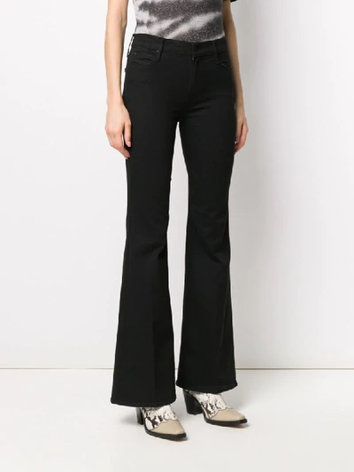 Shop Mother High-rise Flared Jeans In Black