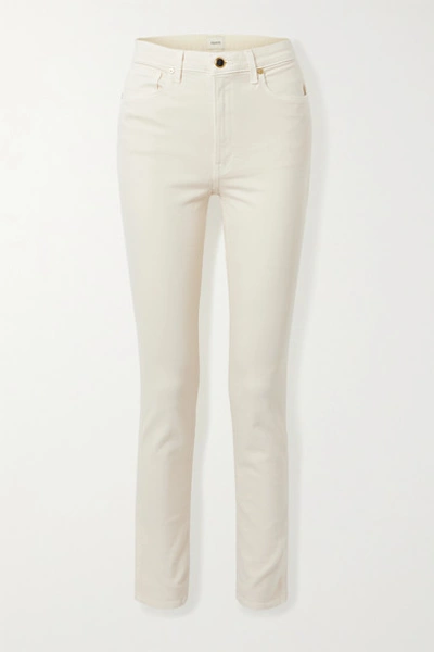 Shop Khaite Vivian High-rise Slim-leg Jeans In Ivory
