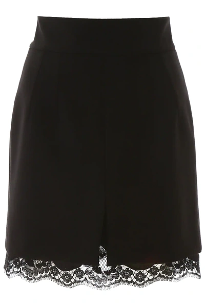 Shop Dolce & Gabbana Mini Skirt With Lace Trim In Black