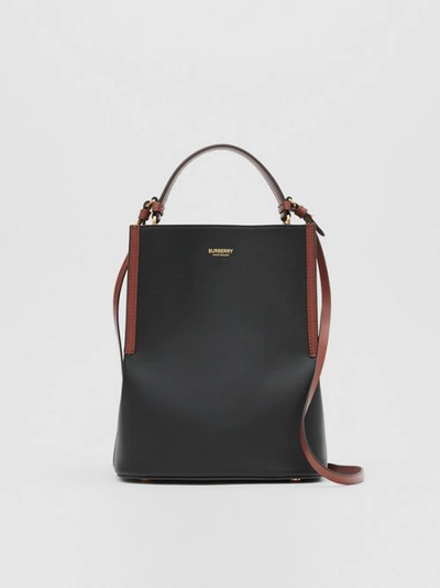 Shop Burberry Small Two-tone Leather Peggy Bucket Bag In Black