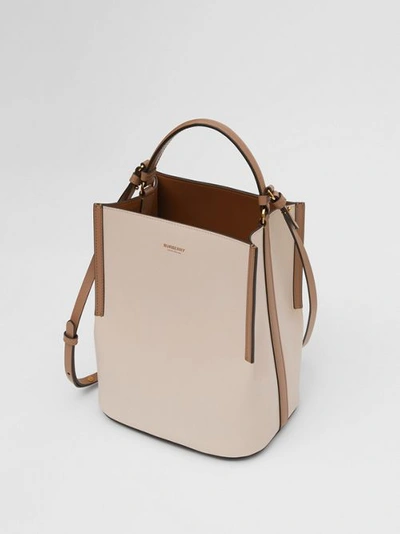 Shop Burberry Small Two-tone Leather Peggy Bucket Bag In Buttermilk