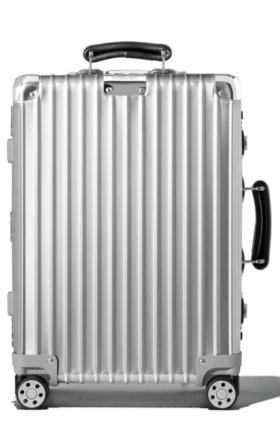 Shop Rimowa Classic 22-inch Wheeled Suitcase In Silver