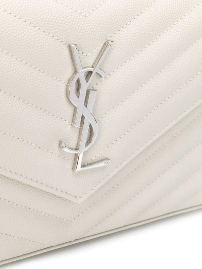 Shop Saint Laurent Monogram Plaque Clutch In White