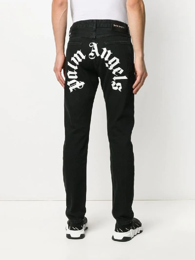 Shop Palm Angels Logo Print Straight Jeans In Black