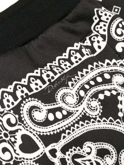 Shop Dolce & Gabbana Graphic Print Track Pants In Black