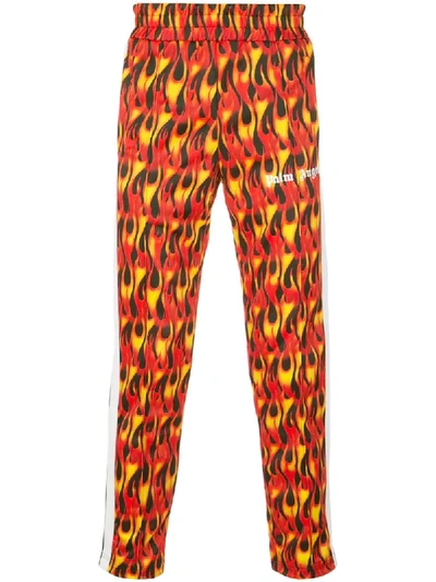 Shop Palm Angels Flame Print Track Pants In Red
