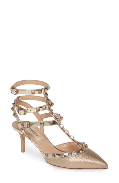 Shop Valentino Rockstud T-strap Pointed Toe Pump In Gold