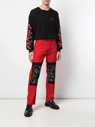 Shop Etudes Studio Études X Keith Haring Red Denim Jeans