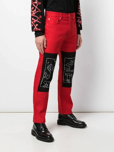 Shop Etudes Studio Études X Keith Haring Red Denim Jeans