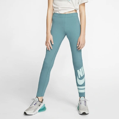Shop Nike Sportswear Big Kids' (girls') Graphic Leggings In Mineral Teal