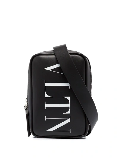Shop Valentino Vltn Logo Crossbody Bag In Black