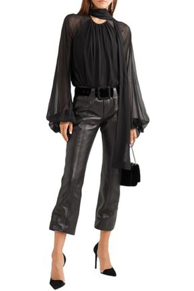 Shop Saint Laurent Cropped Leather Flared Pants In Black