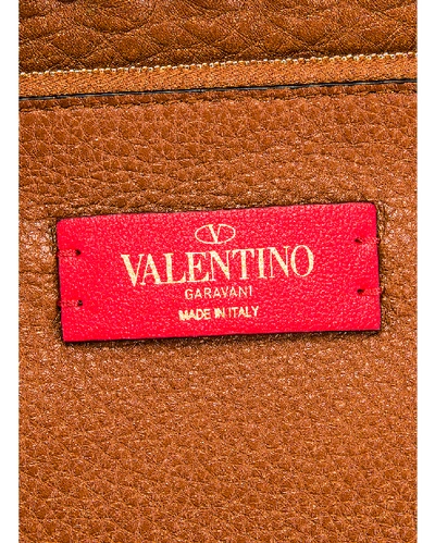 Shop Valentino Small Rockstud Saddle Bag In Selleria